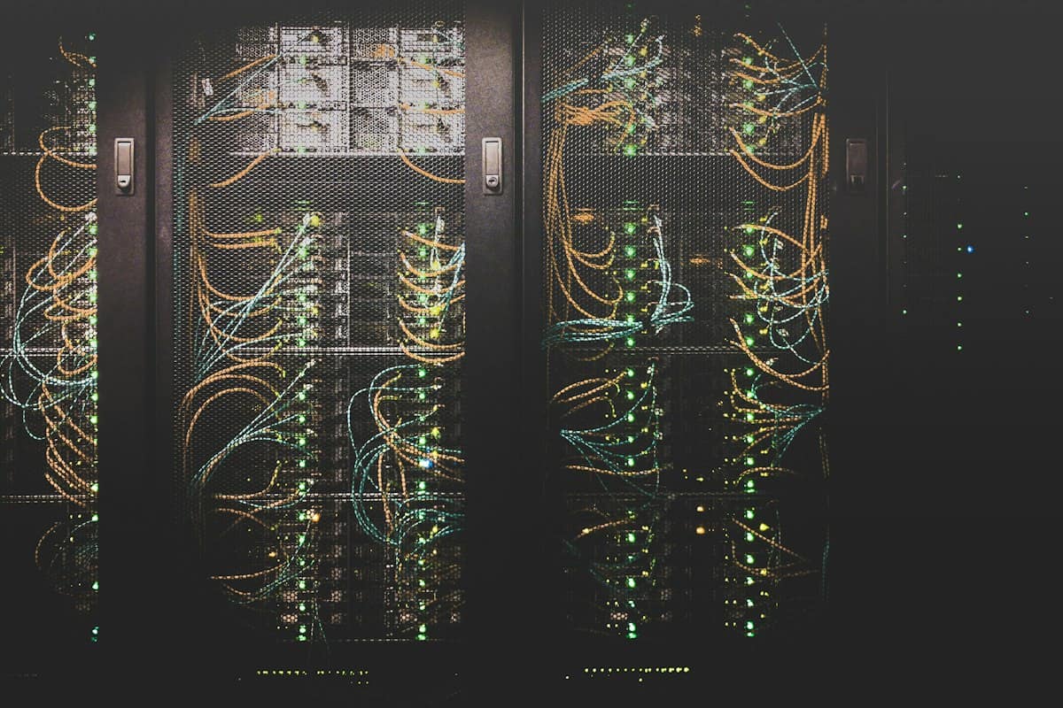 Rows of servers and network cables in a data centre