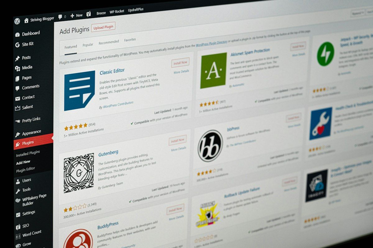 WordPress admin screen showing the Add Plugins page with a grid of plugins